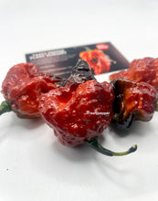 Load image into Gallery viewer, Harvested Gator Jig-Saw Orange superhot pepper pods for seeds